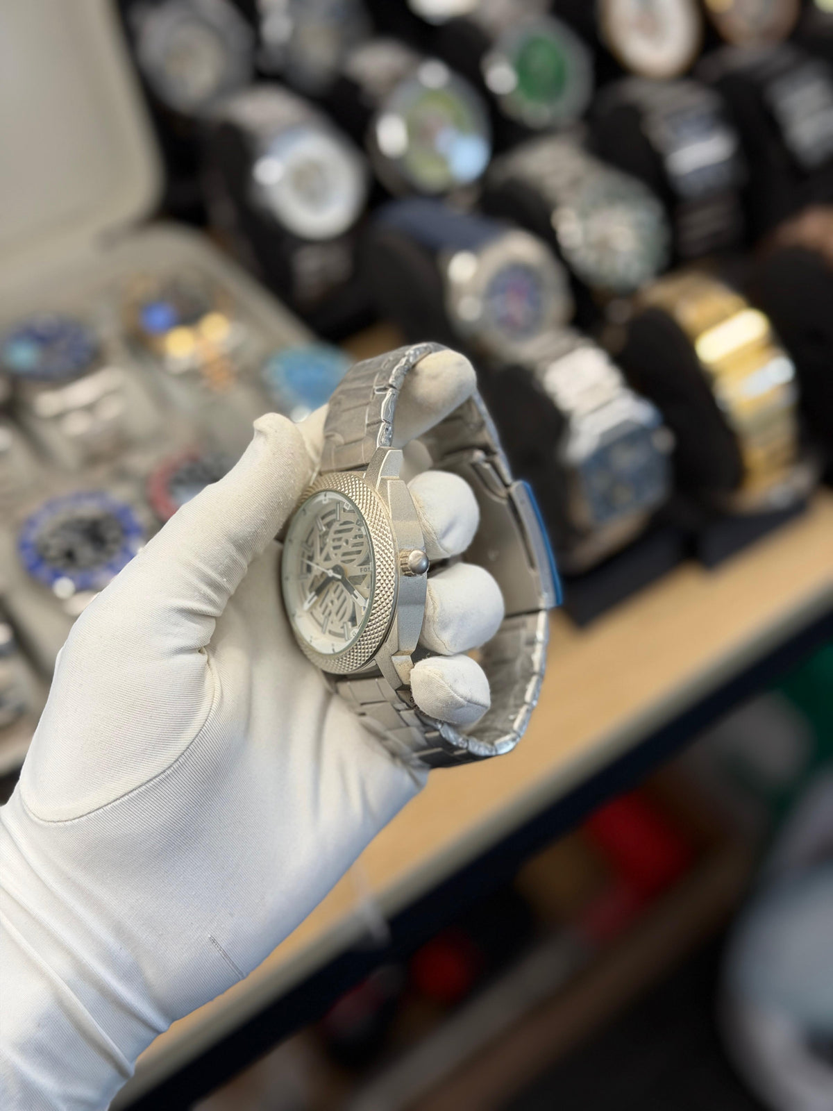 Luxury Silver Skeleton Automatic Watch – Textured Bezel Edition